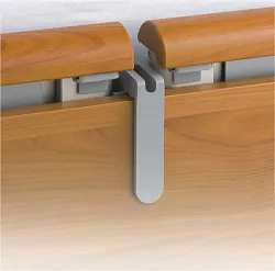 Držák na přílušenství k lůžku