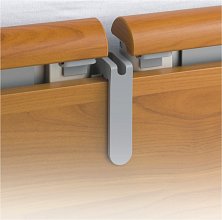 Držák na přílušenství k lůžku